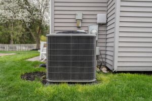 new air conditioning unit installed outside a home