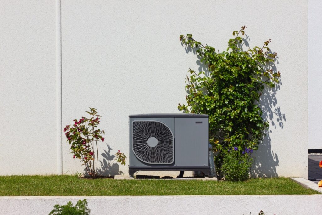 a new heat pump installed outside a home