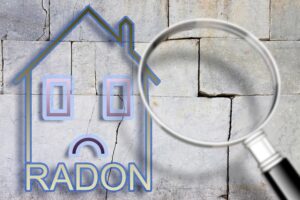 a digital rendering of a house with a sad face on top of a cracked concrete wall, where radon can get in