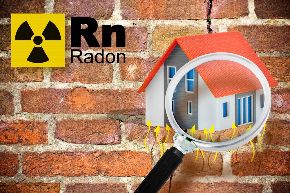 a radon warning symbol next to a digital rendering of a house with squiggly arrows beneath it showing the path of radon